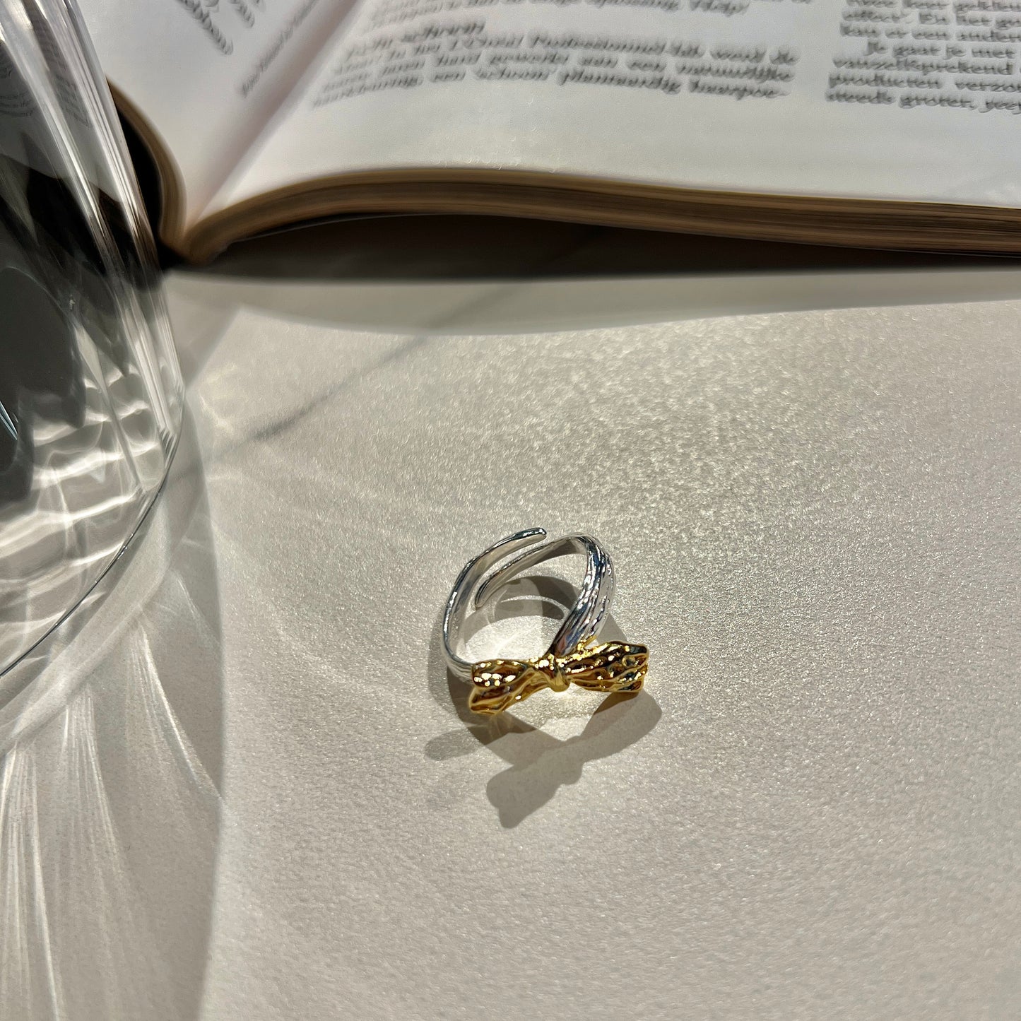 «GOLD BOW RING» — Adjustable Sterling Silver Band with Textured Gold Bow